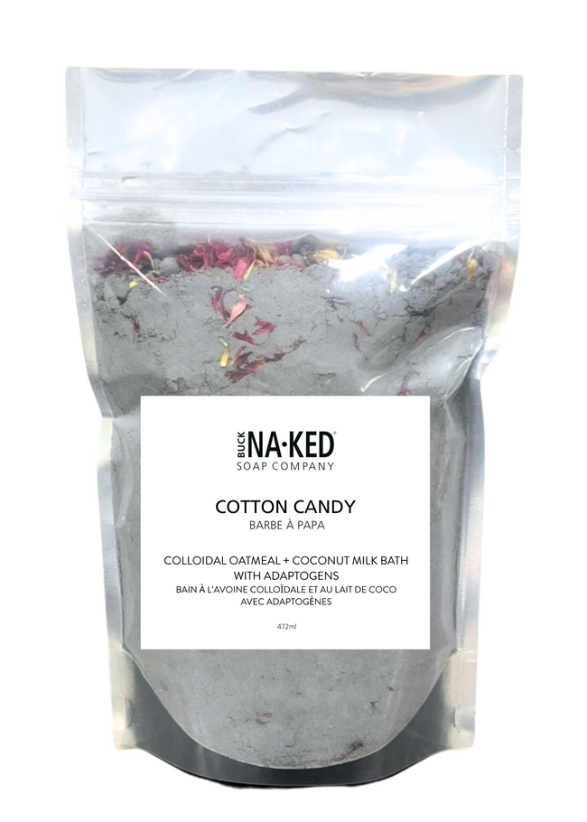 Bag of Cotton Candy colloidal oatmeal and coconut milk bath from Buck Naked Soap Company on a white background.