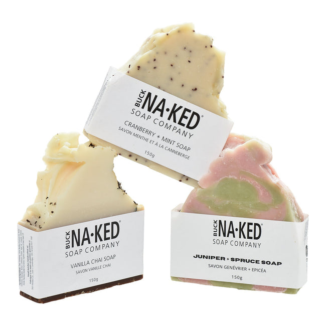 Three soaps from the Naked Soap Company on a white background