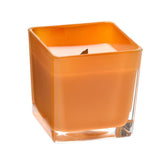 Grapefruit coconut wax candle in orange glass holder