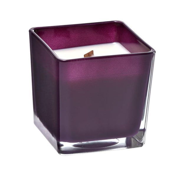 Geranium and lavender coconut wax candle in purple glass holder